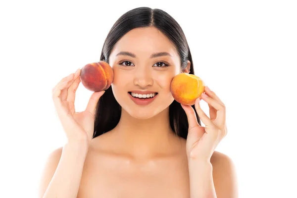 stock-photo-nude-asian-woman-holding-ripe
