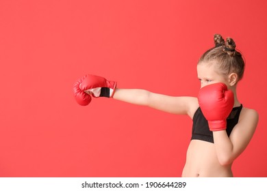 little-girl-boxing-gloves-on-260nw-1906644289.jpg