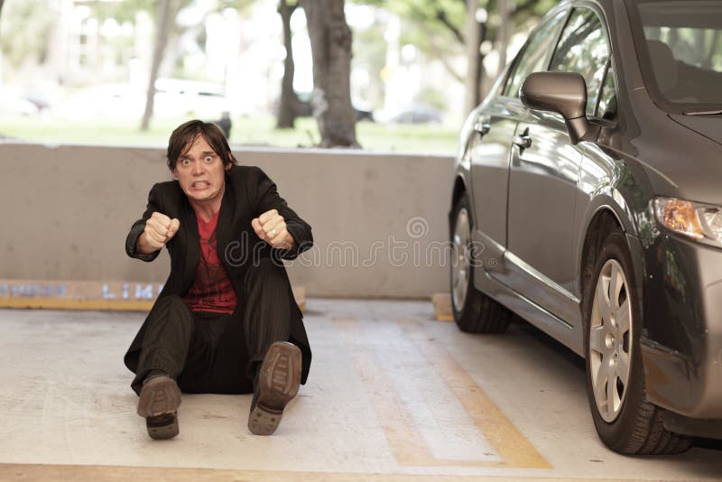 man-pretending-to-drive-car-15791354.jpg