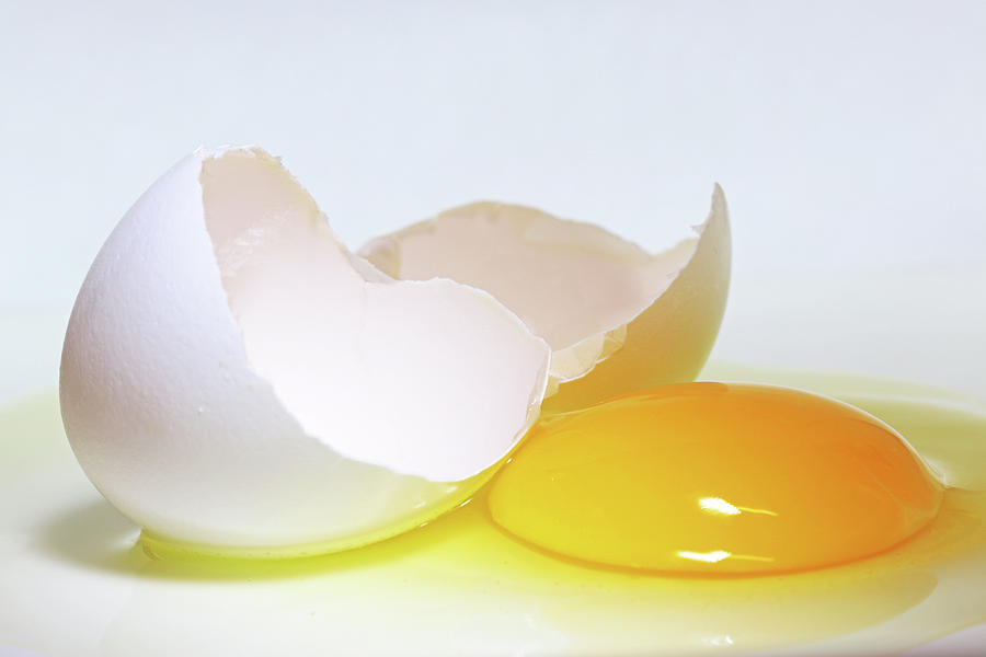 close-up-of-a-broken-egg-on-white-zen-rial.jpg