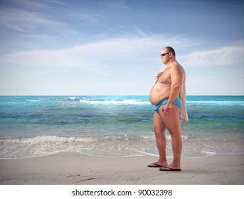 fat-man-seaside-260nw-90032398.jpg