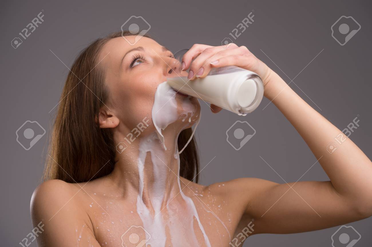 23531255-woman-drinking-milk-beautiful-woman-drinking-milk-isolated-on-grey.jpg